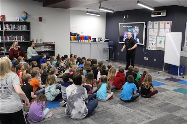 Aaron Reynolds speaks to Elementary Students.